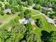 Aerial view showing the home's layout, extensive grounds, and neighborhood at 4628 Dovefield Ln, Kannapolis, NC 28081