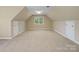Finished bonus room offering ample space and natural light at 4628 Dovefield Ln, Kannapolis, NC 28081