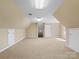 Finished bonus room with ample space and storage at 4628 Dovefield Ln, Kannapolis, NC 28081