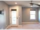 Bedroom with walk out door, recessed lighting, and ceiling fan, offering a bright and airy living space at 745 Garrett Green Way, Fort Mill, SC 29715