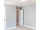 Bedroom featuring plush carpet floors and neutral paint at 745 Garrett Green Way, Fort Mill, SC 29715