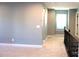 Upstairs hallway with neutral paint, white trim, and access to the bedrooms and bathrooms at 745 Garrett Green Way, Fort Mill, SC 29715