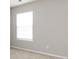 Carpeted bedroom with neutral walls and a window at 8040 Flanders St, Charlotte, NC 28277