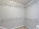 A walk-in closet with white wire shelving and neutral walls at 8040 Flanders St, Charlotte, NC 28277