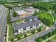 New townhome construction features modern design, set amidst lush landscaping near shopping and amenities at 8723 Nolley Ct, Charlotte, NC 28270