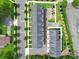 Townhome community showcasing well-manicured landscaping and a practical layout with ample parking at 8723 Nolley Ct, Charlotte, NC 28270