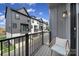 Balcony with a chair overlooking street views at 8723 Nolley Ct, Charlotte, NC 28270