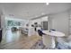 Open-concept living area with a kitchen island, modern appliances, and a comfortable seating area at 8723 Nolley Ct, Charlotte, NC 28270