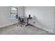 Bright office space with a window, modern desk, and ergonomic chair at 8723 Nolley Ct, Charlotte, NC 28270