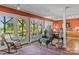 Inviting living area with large glass doors and hardwood floors, perfect for relaxation at 9289 Azalea Rd, Sherrills Ford, NC 28673
