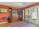 Cozy area with a built-in entertainment center and outdoor views through glass doors at 9289 Azalea Rd, Sherrills Ford, NC 28673