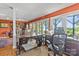 Spacious office area with large desk, built-in shelves, and expansive windows overlooking the landscape at 9289 Azalea Rd, Sherrills Ford, NC 28673