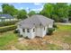Aerial view of home with mature trees surrounding the property at 1000 Oakshade Ave, Kannapolis, NC 28083