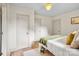 Bright bedroom with white walls, many doors, and hardwood floors at 1000 Oakshade Ave, Kannapolis, NC 28083