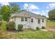 Charming home featuring a white exterior and a well-maintained yard at 1000 Oakshade Ave, Kannapolis, NC 28083