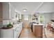 Well-lit kitchen with white cabinets, stainless appliances, and a convenient center island at 1000 Oakshade Ave, Kannapolis, NC 28083