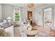 Bright living room with natural lighting, modern decor, and an inviting atmosphere at 1000 Oakshade Ave, Kannapolis, NC 28083