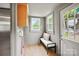 Mud room with a bench seat and two windows at 1000 Oakshade Ave, Kannapolis, NC 28083