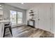 Bright breakfast nook features wood floors, shelves, console table, and window views at 1140 Landsdown Dr, Salisbury, NC 28147
