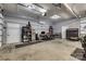 Well-lit garage with storage shelving, workspace, and climate control at 1140 Landsdown Dr, Salisbury, NC 28147