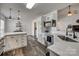 Bright kitchen features white cabinets, stainless appliances and sleek countertops at 1140 Landsdown Dr, Salisbury, NC 28147
