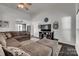Cozy living room with a comfy sectional, ceiling fan and entertainment center at 1140 Landsdown Dr, Salisbury, NC 28147