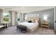 Elegant bedroom with stylish wall paneling, tasteful decor, and cozy window seating at 118 Parker Claire Ln, Kings Mountain, NC 28086