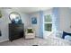 Charming Bedroom with blue accents, a dresser, and a crib, perfect for a baby at 118 Parker Claire Ln, Kings Mountain, NC 28086