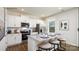 Bright kitchen featuring stainless steel appliances, granite countertops, a breakfast bar, and white cabinetry at 118 Parker Claire Ln, Kings Mountain, NC 28086