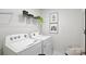 Efficient laundry area with modern washer and dryer units and ample storage space at 118 Parker Claire Ln, Kings Mountain, NC 28086
