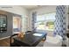 Home office with hardwood floors, a large window with a view, a desk, and modern decor at 118 Parker Claire Ln, Kings Mountain, NC 28086