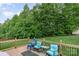 The outdoor deck provides a stunning view of the backyard's well-maintained landscaping at 1221 Woodpecker Dr, Clover, SC 29710
