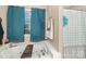 Inviting bathroom featuring a bathtub and a bright window at 1221 Woodpecker Dr, Clover, SC 29710