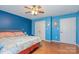 Comfortable bedroom features a ceiling fan, and two closets for ample storage space at 1221 Woodpecker Dr, Clover, SC 29710