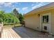 Inviting backyard deck, perfect for outdoor relaxation and entertaining, with a door for easy access to the home's interior at 1221 Woodpecker Dr, Clover, SC 29710