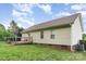 The home has a well-maintained lawn, vinyl siding and a wooden deck at 1221 Woodpecker Dr, Clover, SC 29710