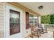 Cozy front porch features rocking chairs, perfect for enjoying quiet moments at 1221 Woodpecker Dr, Clover, SC 29710