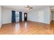 Open living room boasting hardwood floors, natural light, and access to other areas of the house at 1221 Woodpecker Dr, Clover, SC 29710