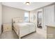 Cozy bedroom with comfortable queen bed and ensuite bathroom at 13204 Feale Ct, Charlotte, NC 28278