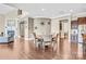 Open-concept Dining Room with hardwood floors and neutral paint at 13204 Feale Ct, Charlotte, NC 28278