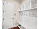 Functional mudroom with built-in shelving, coat hooks, and a convenient bench at 13204 Feale Ct, Charlotte, NC 28278
