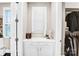 Well-organized walk-in closet with built-in vanity, drawers, and ample storage space at 13204 Feale Ct, Charlotte, NC 28278