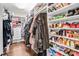 Walk-in closet with custom shelving, ample storage for clothes, shoes, and accessories at 13204 Feale Ct, Charlotte, NC 28278