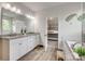 Modern bathroom with double sink vanity and an adjacent bathtub with granite countertop at 155 Boxelder Rd, Clover, SC 29710