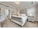 Elegant primary bedroom suite with tray ceiling, tasteful decor, and ample space for relaxation at 155 Boxelder Rd, Clover, SC 29710