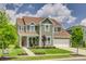 Charming two-story home boasts lush landscaping, a welcoming front porch, and a two-car garage at 155 Boxelder Rd, Clover, SC 29710
