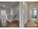 Upstairs hallway with hardwood floors showcases the open layout and access to bedrooms at 155 Boxelder Rd, Clover, SC 29710