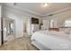 A beautifully furnished bedroom with a tray ceiling, carpet floors and white walls at 155 Boxelder Rd, Clover, SC 29710