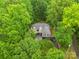 Stunning aerial view of a home nestled in a lush green forest at 1669 Mary Ellen Dr, Fort Mill, SC 29708