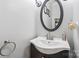 Bathroom featuring a stylish sink, mirror, and lighting fixtures, with a neutral color palette at 1669 Mary Ellen Dr, Fort Mill, SC 29708